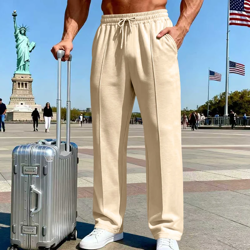 Pantalones rectos de hombre con cintura elástica y cordón ajustable.